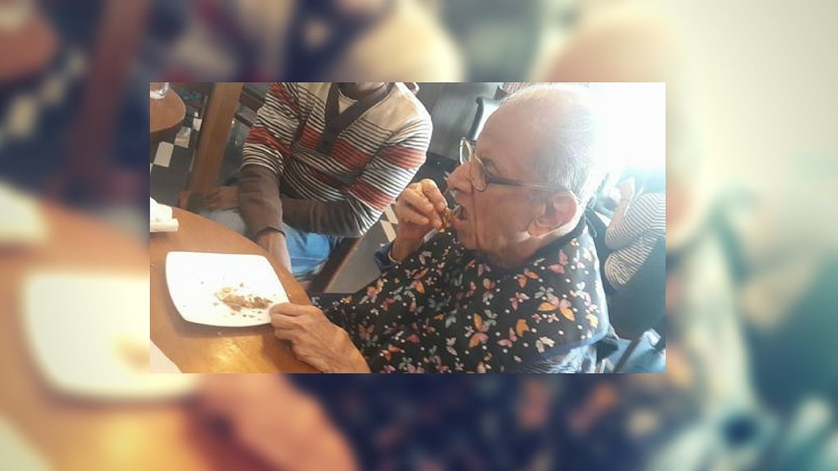 Anna enjoys oatmeal and raisin cookie after drinking a cappuccino. (Photo Courtesy: Sangeeta Murthi Sahgal)
