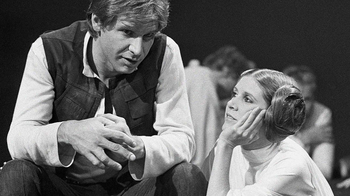 Carrie fisher with co-star Harrison ford. (Photo Courtesy: AP)