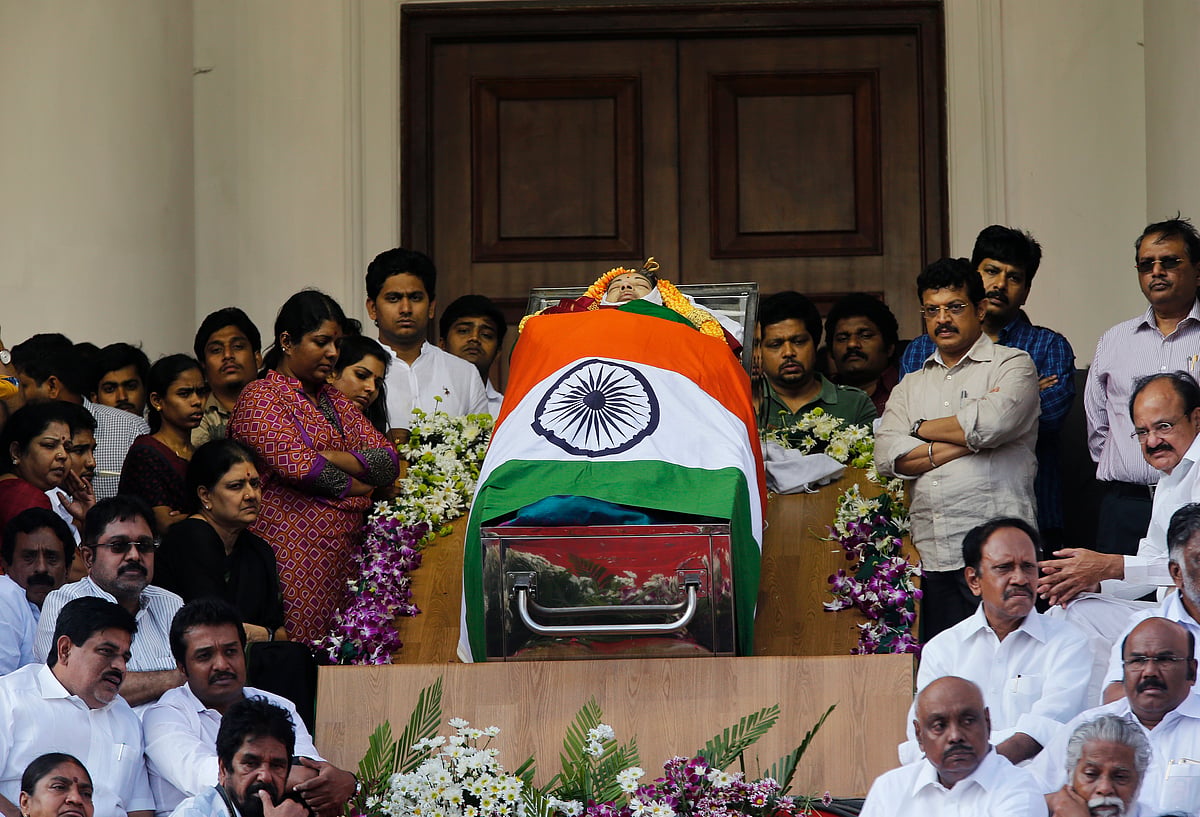 People pay their respects to Tamil Nadu Chief Minister J Jayalalitha at Rajaji Hall (Photo: AP)