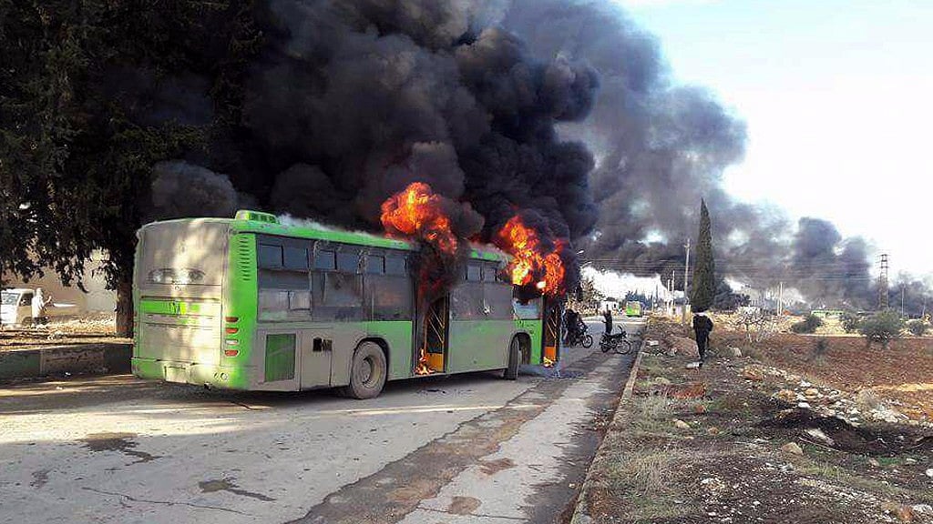 Videos posted on social media showed bearded men with guns cheering and shouting “God is great” after torching the green buses. (Photo: AP)