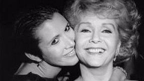 Carrie Fisher with her mother Debbie Reynolds. Reynolds passed away a day after Fisher. (Photo: Twitter/<a href="http://https://twitter.com/search?src=typd&q=debbie%20reynolds">@girlposts</a>)