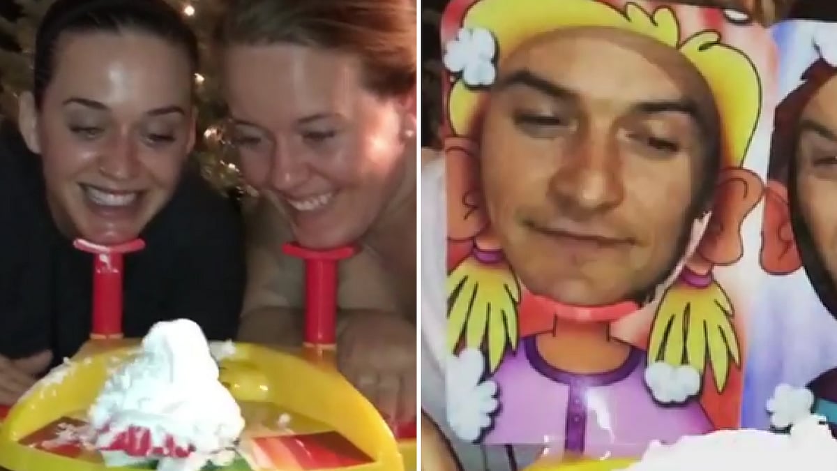 Katy Perry and Orlando Bloom play the pie face game. (Photo: <b>The Quint</b>)