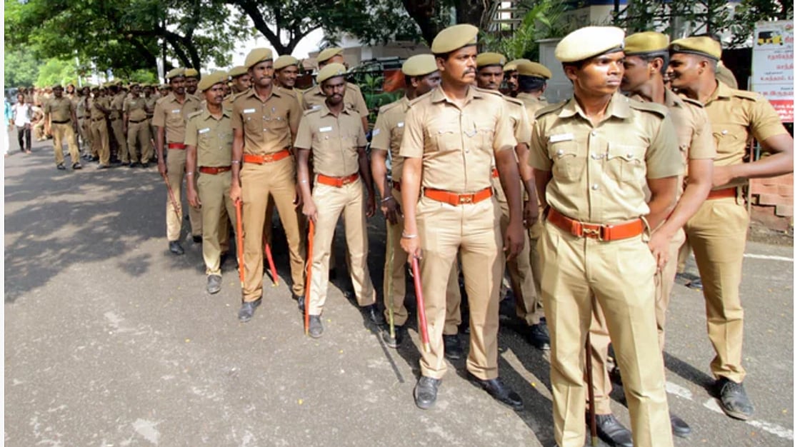 Police personnel  are drawing praise for their handling of the potentially volatile situation after J Jayalalithaa’s death. (Photo: IANS)