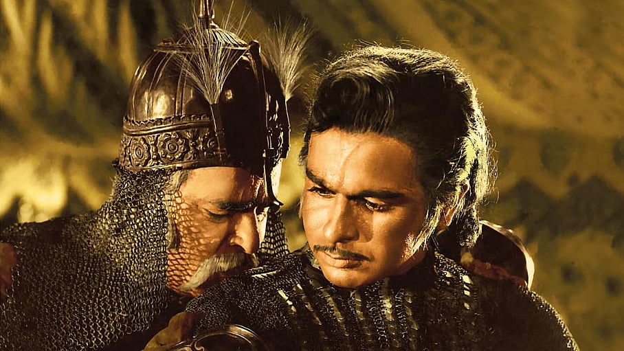  Dilip Kumar with Prithviraj Kapoor in <i>Mughal E Azam.</i>