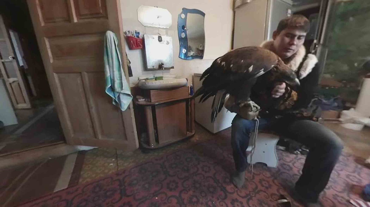 A Kazakh eagle with its trainer. (Photo Courtesy: Shamil Zhumatov)