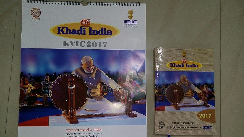 Modi is seen in the same iconic pose as Gandhi was photographed in.(Photo: IANS)