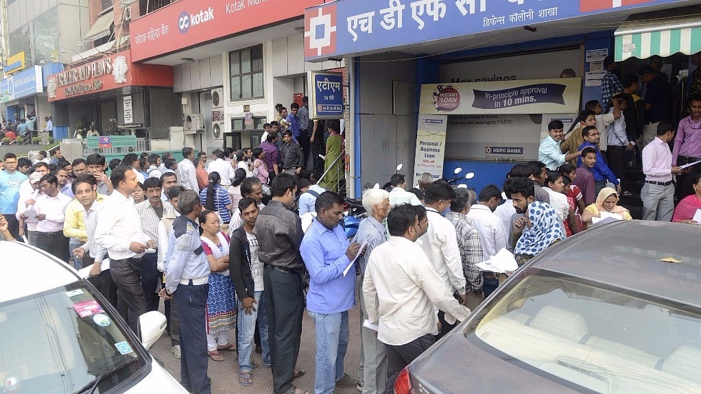 

People wait outside banks to exchange currency notes following the 8 November demonetisation announcement. (Photo: IANS)