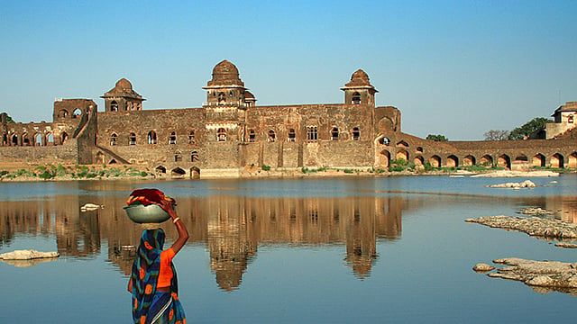 Floating over it’s own reflection, the Jahaz Mahal in Mandu looks like a ship that’s about to sail. (Photo: MP Tourism) 