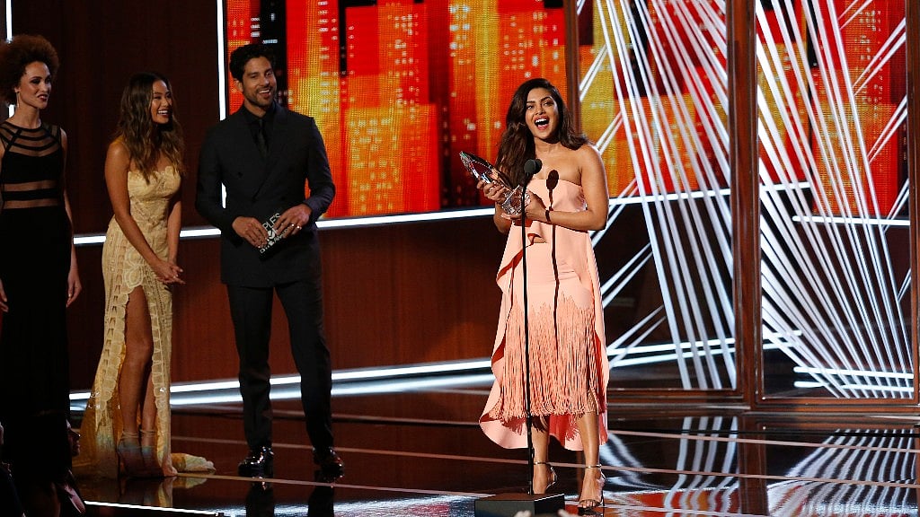 Priyanka Chopra accepts her award. (Photo: Reuters)