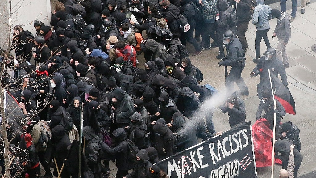 Police use pepper spray on protesters in Washington. (Photo: AP) 
