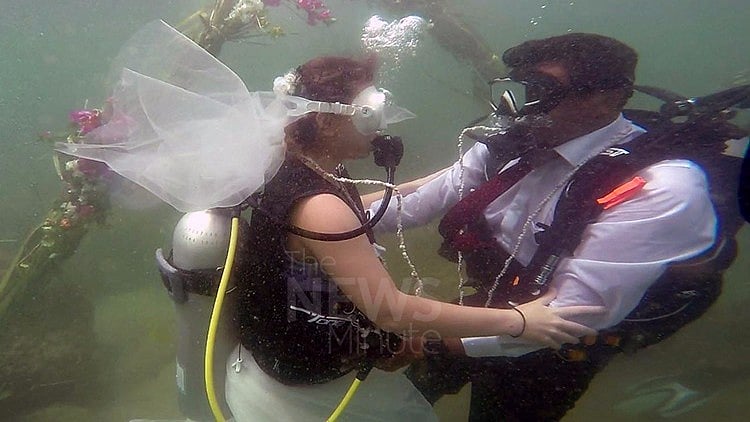 Slovakian national Eunika Pogran and Maharashtrian Nikhil Pawar’s wedding ceremony played out nearly 4 metres underwater. (Photo Courtesy: The News Minute)