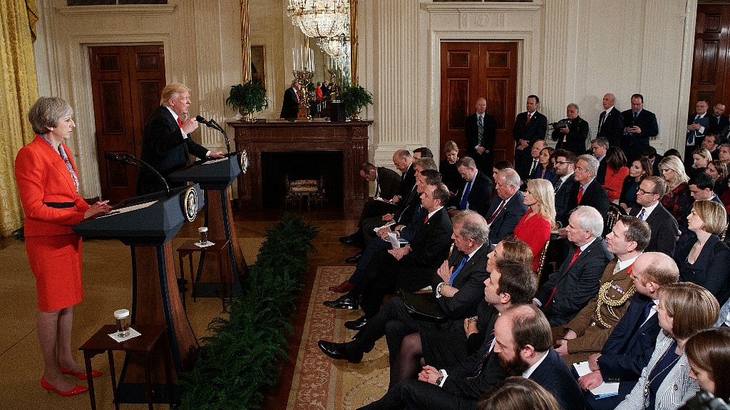 US President Donald Trump and British Prime Minister Theresa May address a press conference on Friday. (Photo: AP)