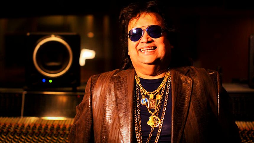<div class="paragraphs"><p>Bappi Lahiri. </p></div>