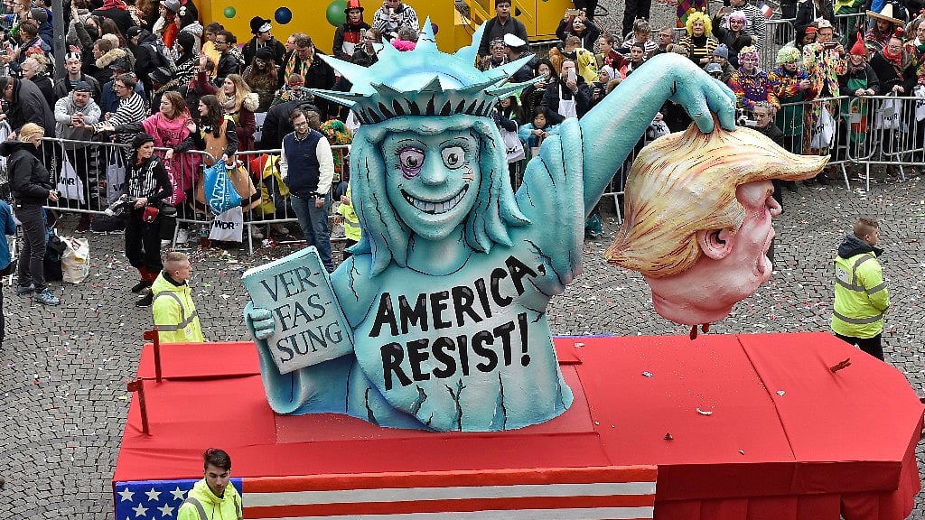 A carnival float depicting the severed head of US president Donald Trump and the Statue of Liberty during the carnival parade in Duesseldorf, Germany, on 27 February 2017. (Photo: AP)