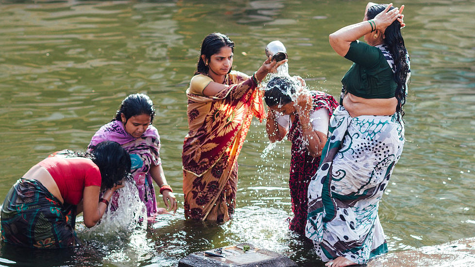 In many villages, an informally decided upon time is kept aside for women taking a bath in a group. (Photo: Adam Cohn) 
