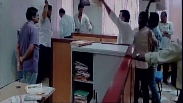 Students damaged furniture, as the CBFC board had not cleared Telugu film <i>Sharanam Gachchami</i>. (Photo Courtesy: <a href="http://file:///C:/Users/THEQUINT110/Desktop/ani%20students.html">ANI</a>)
