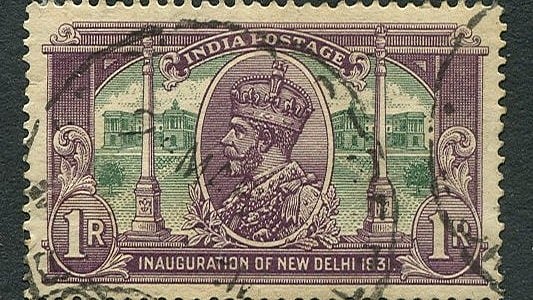 The 1931 series celebrated the inauguration of New Delhi as the seat of government. The one rupee stamp shows George V with the “Secretariat Building” and Dominion Columns.