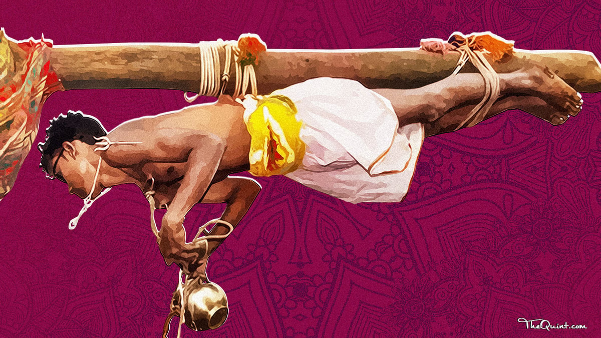 A man performing Garudan Thookam, one of the many traditional practices of India. (Photo: <b>The Quint</b>)