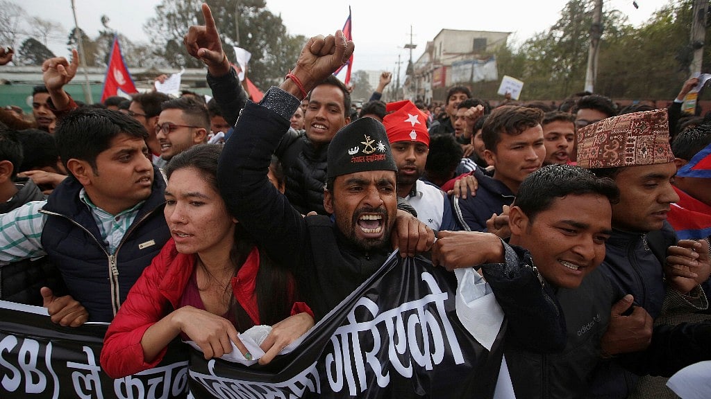 Nepalese students affiliated with the All Nepal National Free Students Union, a student wing of the Communist Party of Nepal Unified Marxist Leninist, protest near the Indian Embassy. (Photo: Reuters)