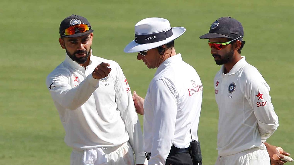 Virat Kohli in conversation with an umpire during a Test match. (Photo: BCCI)