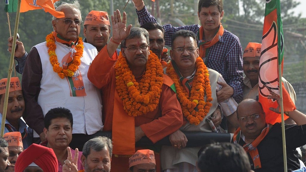 BJP’s Trivendra Singh Rawat will be sworn in as Uttarakhand Chief Minister. (Photo Courtesy: Facebook/<a href="https://www.facebook.com/tsrawatbjp/photos/p.940971209256734/940971209256734/?type=1&opaqueCursor=Abrd1Jnv5EqiU4djCCY-UGQXYZSFVYCfAUAwFR7go44lqAFJ2zTSX8het7FR-MD41lhUotz96tjuKJqkShocTsYsMGmox07qqYvIJVle9yAkk3gcoEa2LmjTqVo1QfB2iOPEKzaMSE4lSsNgZEF1ekkkXW5YTM9dBsY-0UPdYvo9EEElAq6bdYcuRNeqxu3mgdHcL5FtNgvyqfPC7KgIESGuICsWJAVSAz5erwPxsXqjM1LEk8oIrI0A2KygnCZgRM_R0LB3g2mmBt0R4EpMwlrhpFevDvOSuDzBuyjBLgCJ9U8OwPXyyikZk9CmjpKX50QxOk76gKPhHoFHDEC1dkMoVLo9bfglGqeHq8EJ_Wy8cTAqBN2DhG8LJrjJGg-qp4xGGb8ElbvagoAGRLtye5f57UkL_Pua8mqAF6Ikv2xCzKpZH9pskfNXt_59993aPU8&theater">Trivendra Singh Rawat</a>)