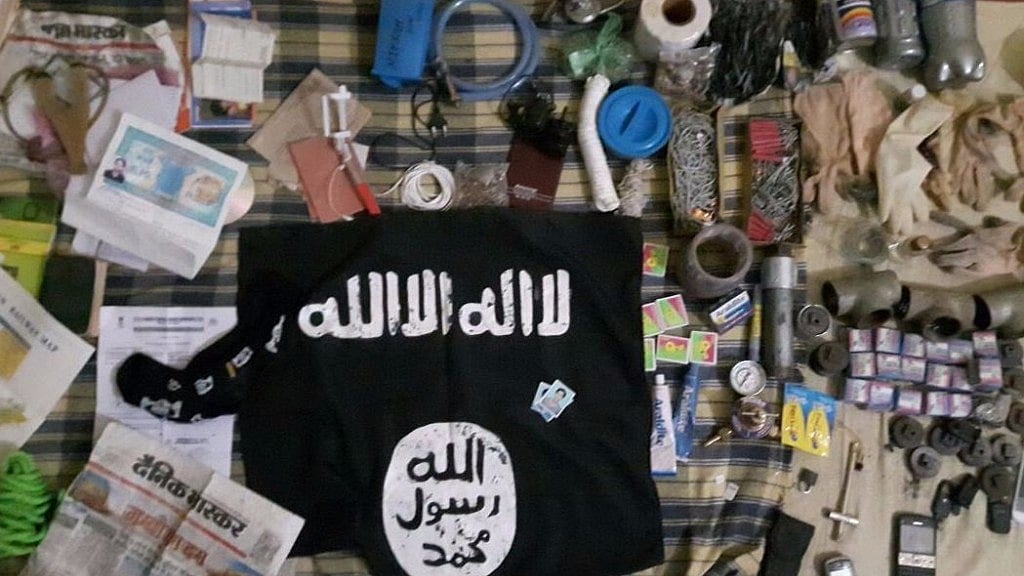 An ISIS flag was among the articles found inside the house where Saifullah was holed up. (Photo: ANI Screengrab)