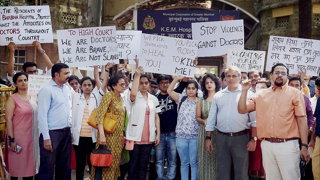 Doctors take out a protest rally at the KEM hospital to demand security after an intern was assaulted by a patient’s relatives in Mumbai on Wednesday. (Photo: PTI)