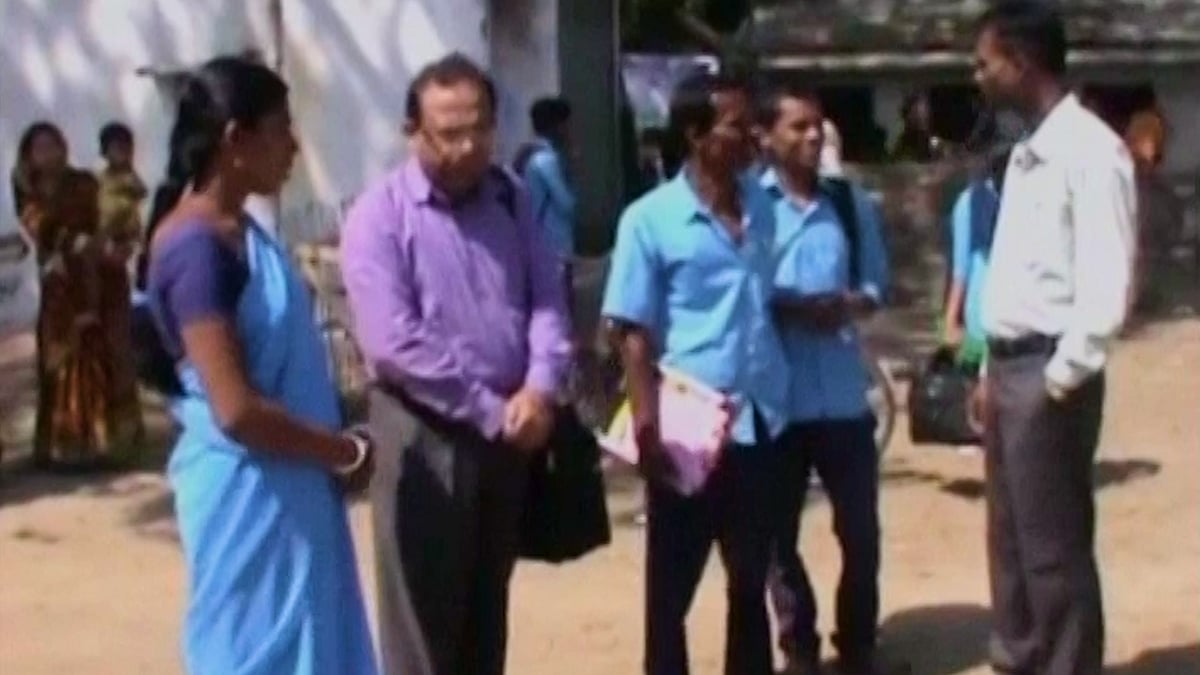 This family of three from West Bengal (dressed in blue) studied together for the state board exams. (Photo: ANI Screengrab)