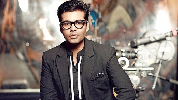 Karan Johar has become a proud parent of twins. (Photo courtesy:<a href="https://twitter.com/cinemaghar1/status/838247252892266496"> Twitter/ @cinemaghar1</a>)