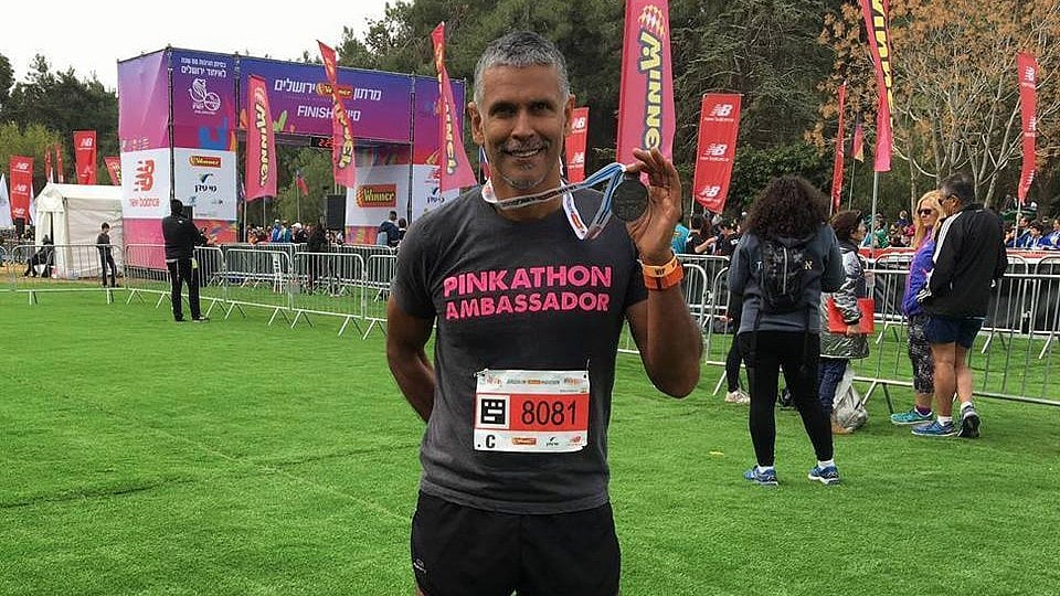Milind Soman says a prayer in Jerusalem. (Photo courtesy: <a href="https://www.facebook.com/MilindRunning/photos/rpp.519378534858179/1117434935052533/?type=3&theater">Facebook/Milind Soman</a>)
