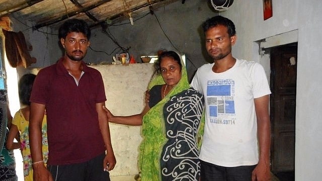 Purnachandra’s Senapati widowed mother (centre) , and two brothers (left and right)(Photo Courtesy: Ashis Senapati)