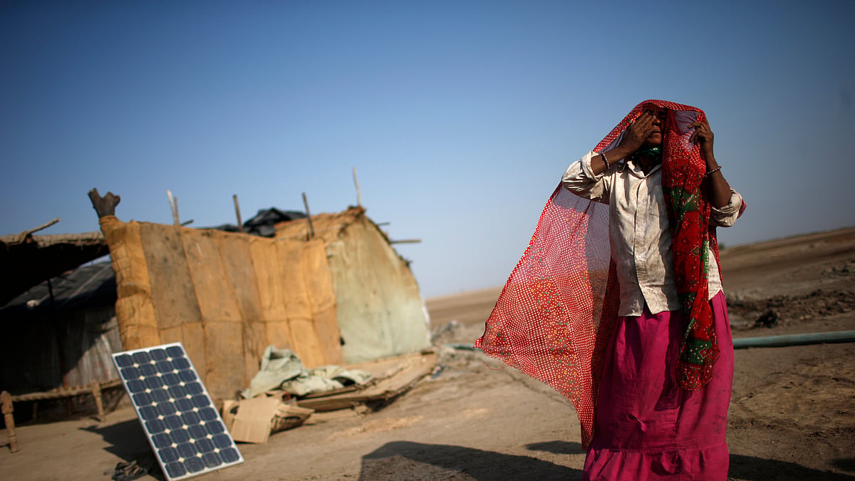 A labourer outside a shelter in Little Rann of Kutch in the western Indian state of Gujarat, March 2, 2014. (Photo: Reuters)