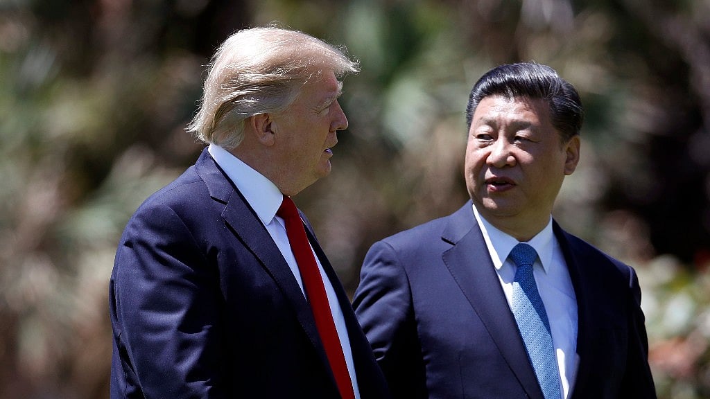 US President Donald Trump (left) in conversations with Chinese President Xi Jinping (right) (Photo: AP)