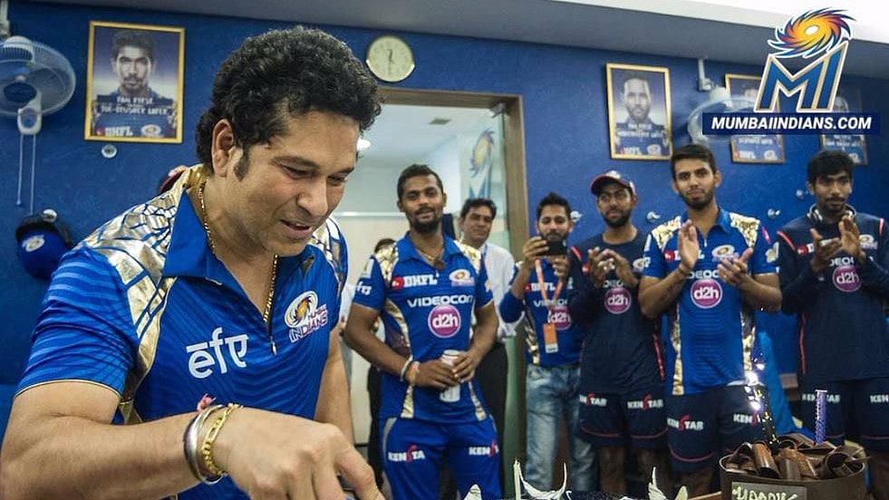 Sachin Tendulkar cuts a birthday cake in Mumbai on Tuesday. (Photo: Mumbai Indians/Twitter)