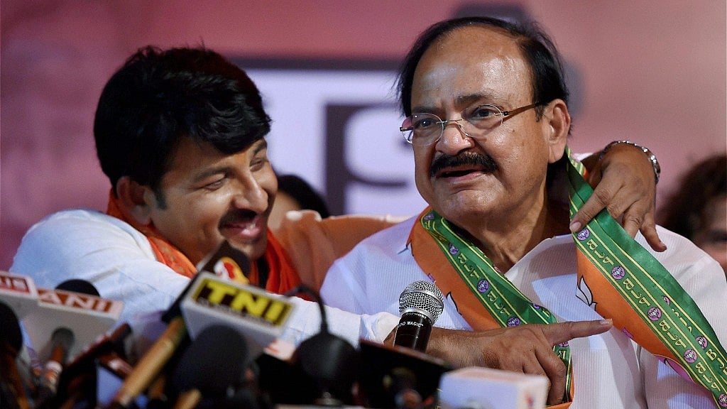 Union Minster Venkaiah Naidu (right) with Delhi BJP President Manoj Tiwari. (Photo Courtesy: PTI)