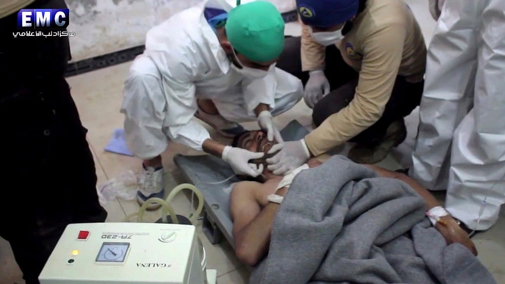 Victims of the chemical attack being treated at a makeshift hospital. (Photo: AP)