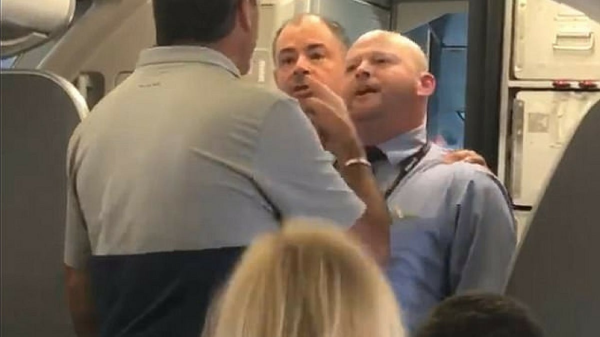An American Airlines flight attendant has been suspended pending an investigation after he allegedly smacked a mother with her baby stroller. (Photo Courtesy: Facebook)