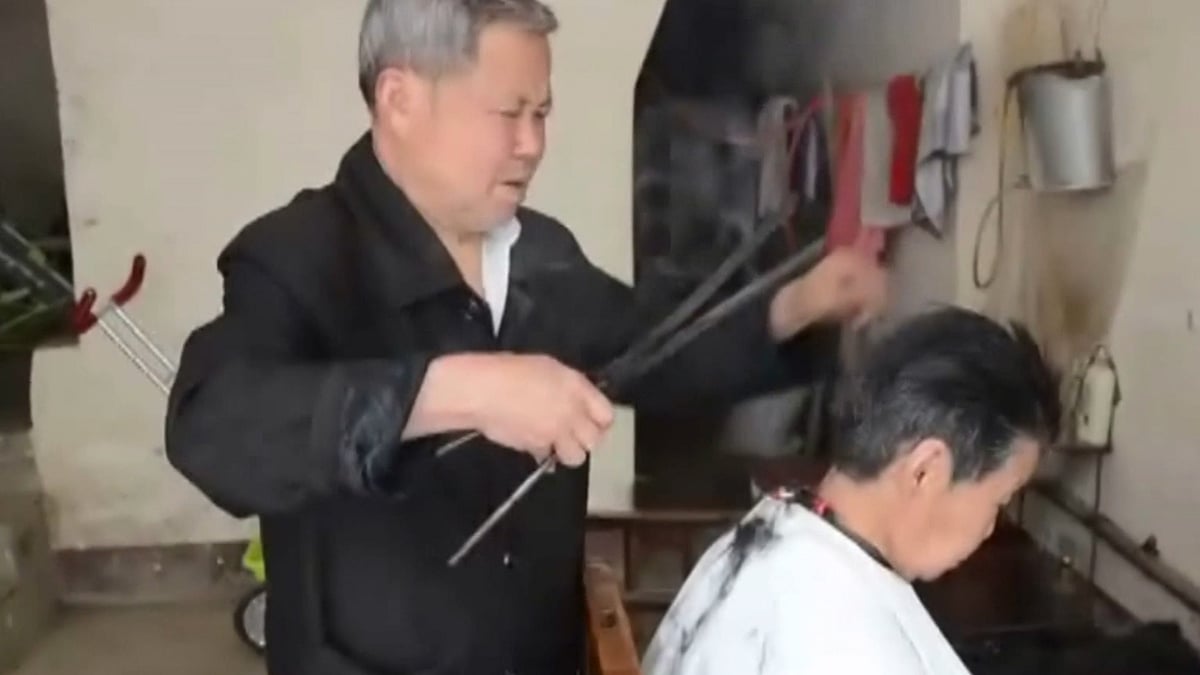 Hair straightening with heated tongs (Photo: AP Screengrab)