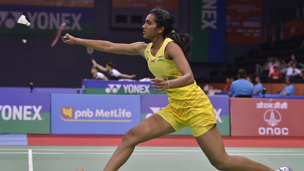 Sindhu pushing the shuttle during a match. (Photo- IANS)