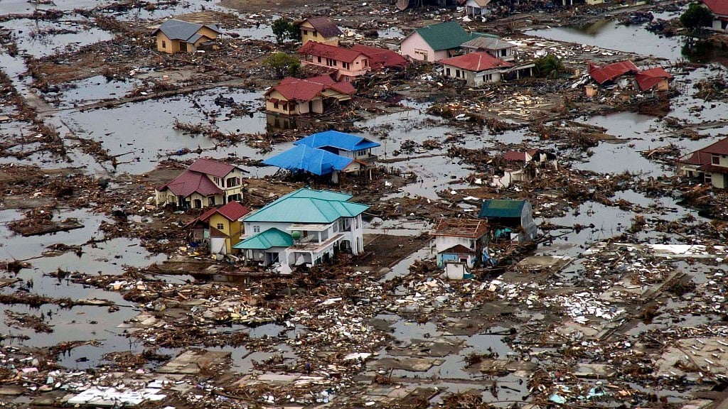 (Photo Courtesy:<a href="https://upload.wikimedia.org/wikipedia/commons/4/48/US_Navy_050102-N-9593M-035_A_village_near_the_coast_of_Sumatra_lays_in_ruin_after_the_Tsunami_that_struck_South_East_Asia.jpg"> </a>Wikimedia Commons/<a href="https://upload.wikimedia.org/wikipedia/commons/4/48/US_Navy_050102-N-9593M-035_A_village_near_the_coast_of_Sumatra_lays_in_ruin_after_the_Tsunami_that_struck_South_East_Asia.jpg">US Navy</a>)