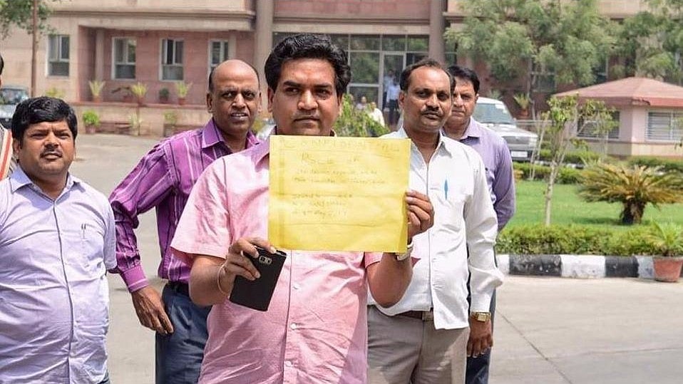 Kapil Mishra on Monday submitted documents to the Anti-Corruption Branch (ACB) to back his allegations that Delhi Chief Minister Arvind Kejriwal. (Photo Courtesy: Twitter/@2GuessWhat4)