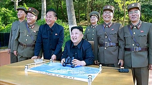 North Korean leader Kim Jong Un, center, watches the test launch of ballistic missiles. (Photo: <a href="http://www.apexchange.com/pages/OneUp.aspx?id=bfbcf93d88cb4544beca0c4e86255640&links=NORTH,KOREA,MISSIL,TEST,USABL,WK21Y2017,W21Y2017&media=Photo&slug=&fid=d64c8e3ee1774b50be32258be9f48a8f">AP</a>)