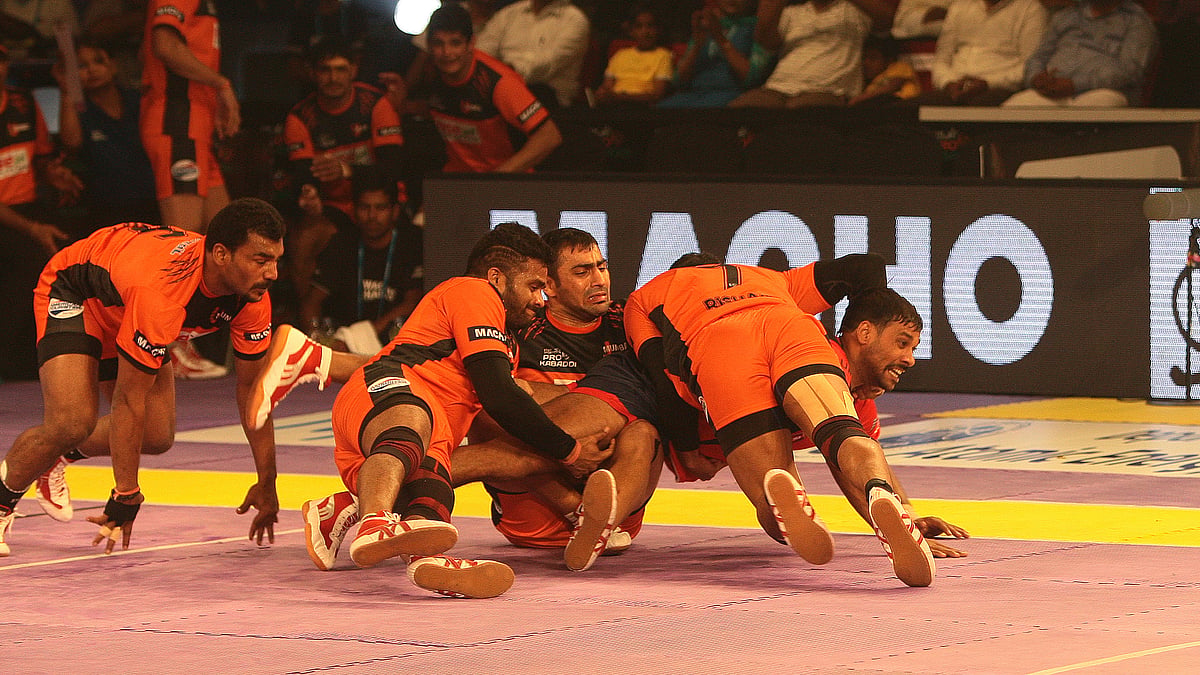 U Mumba gets hold of Delhi’s Amit Kumar during the first season of Pro Kabaddi League. (Photo Courtesy: Pro Kabaddi League)