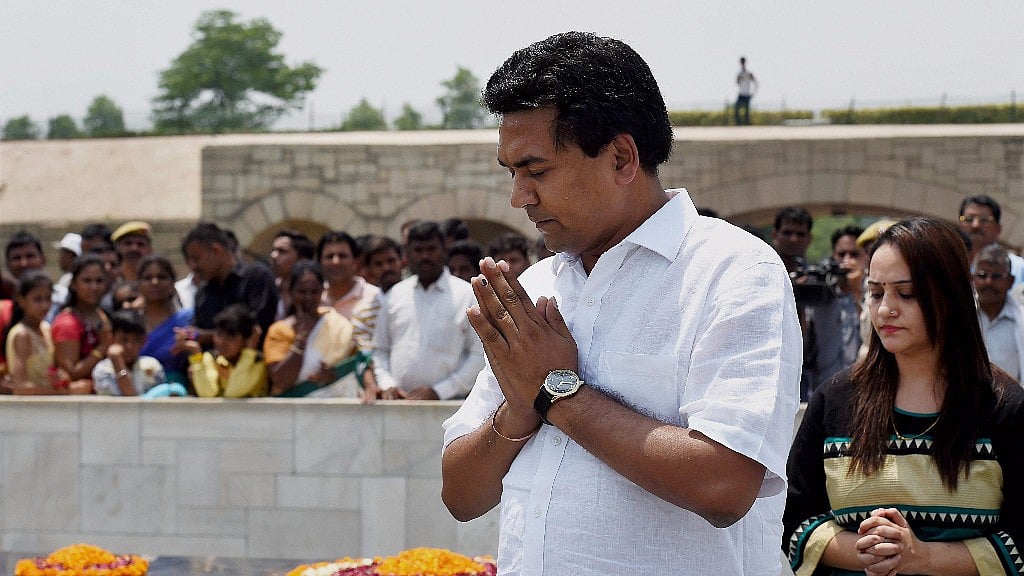 Sacked Aam Aadmi Party minister Kapil Mishra pays homage to Mahatma Gandhi at Raj Ghat in new Delhi on Sunday. (Photo: PTI)