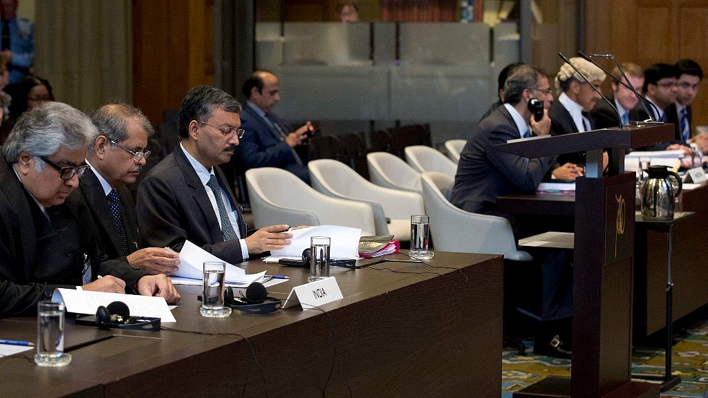 The Hague: Delegations of India, left, and Pakistan, right, wait for judges to enter the World Court in The Hague, Netherlands, on Monday, 15 May 2017. (Photo Courtesy: PTI)