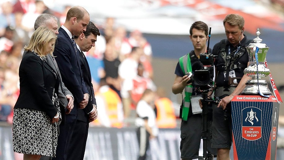 Britain’s Prince William, third from left, stands next to wreaths laid on the side of the pitch, as a tribute to the victims of the Manchester bomb attack before the FA Cup final between Arsenal and Chelsea. (Photo: AP) 