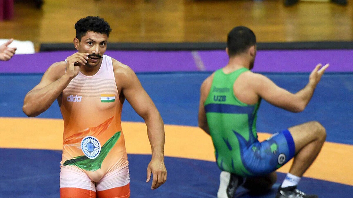 Anil Kumar walks away after defeating Muhammadali Shamsiddinov (UZB) in the Senior GR-85 kg category during 2017 Senior Asian Wrestling Championship. (Photo: PTI)