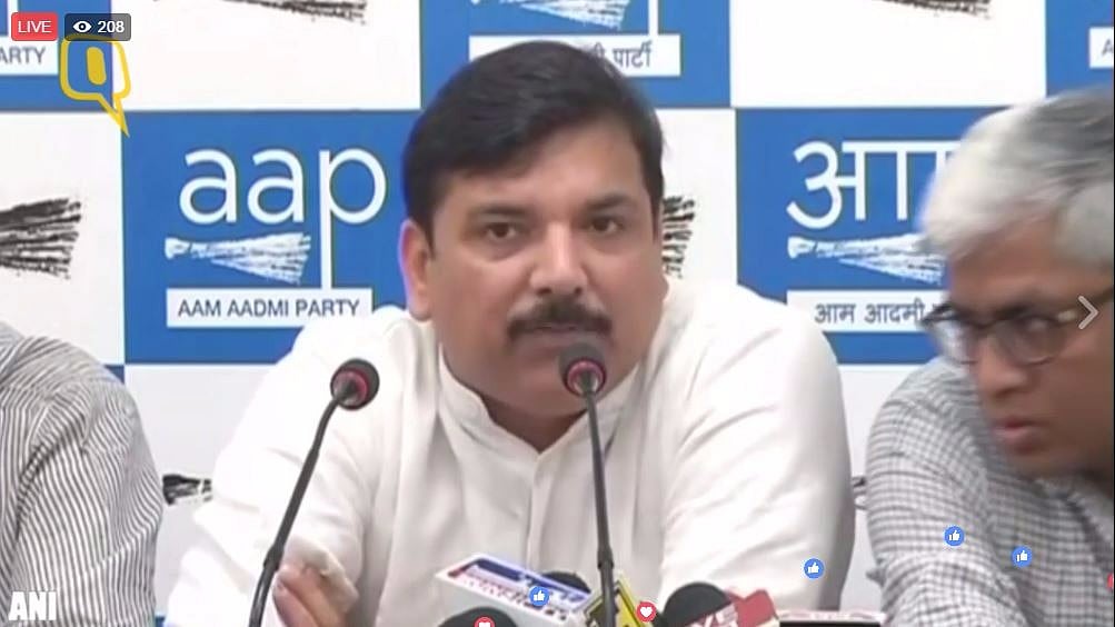Senior AAP leader Sanjay Singh addressing the media (Photo Courtesy: ANI Screengrab)