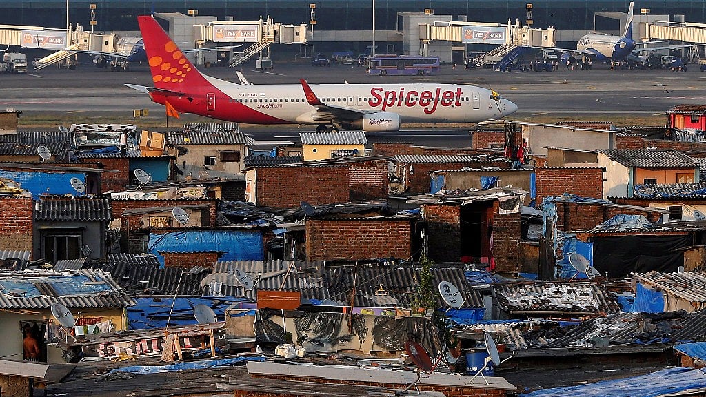 One-third of the Mumbai airport land is encroached upon by illegal squatters. (Photo: Reuters)