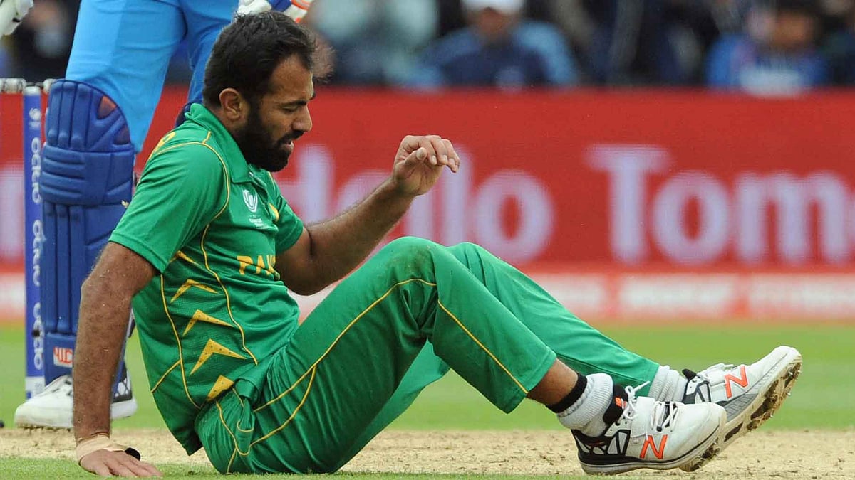 Pakistan’s Wahab Riaz sustained an ankle injury during the Champions Trophy match against India at Edgbaston on Sunday. (Photo: AP) 